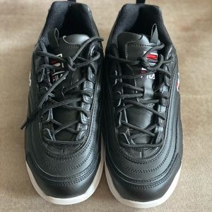 Women Size 8 FILA sneakers in black. Worn once. Excellent condition. No box.